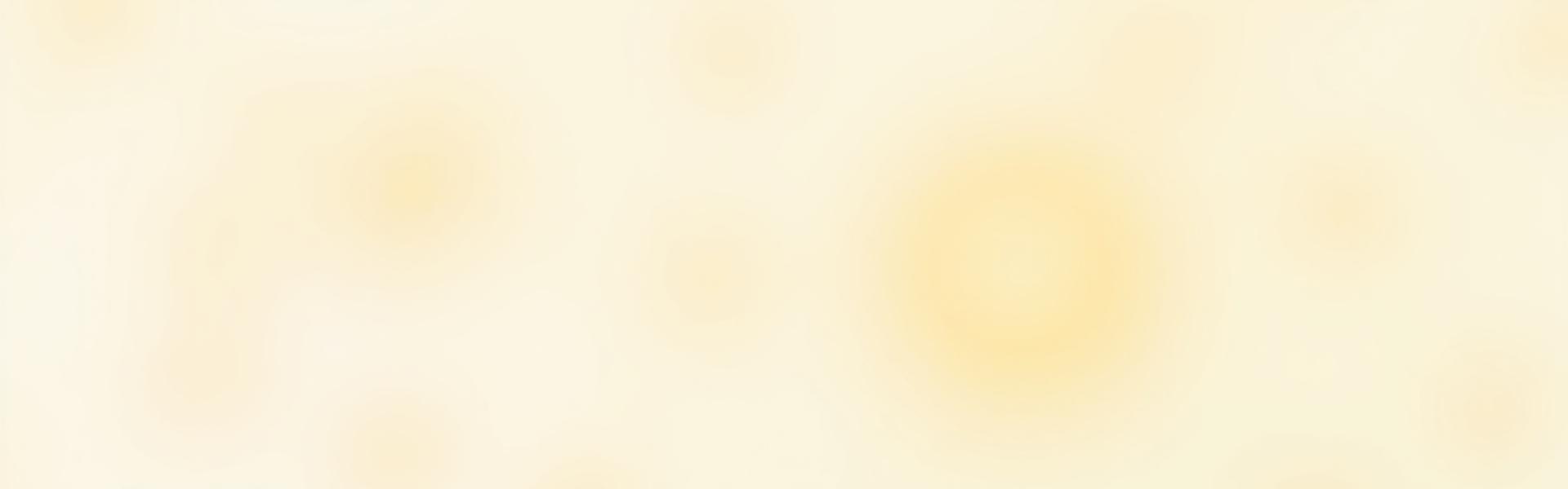 Soft-focus image of colloidal oatmeal and calendula petals, representing calming ingredients for sensitive skin